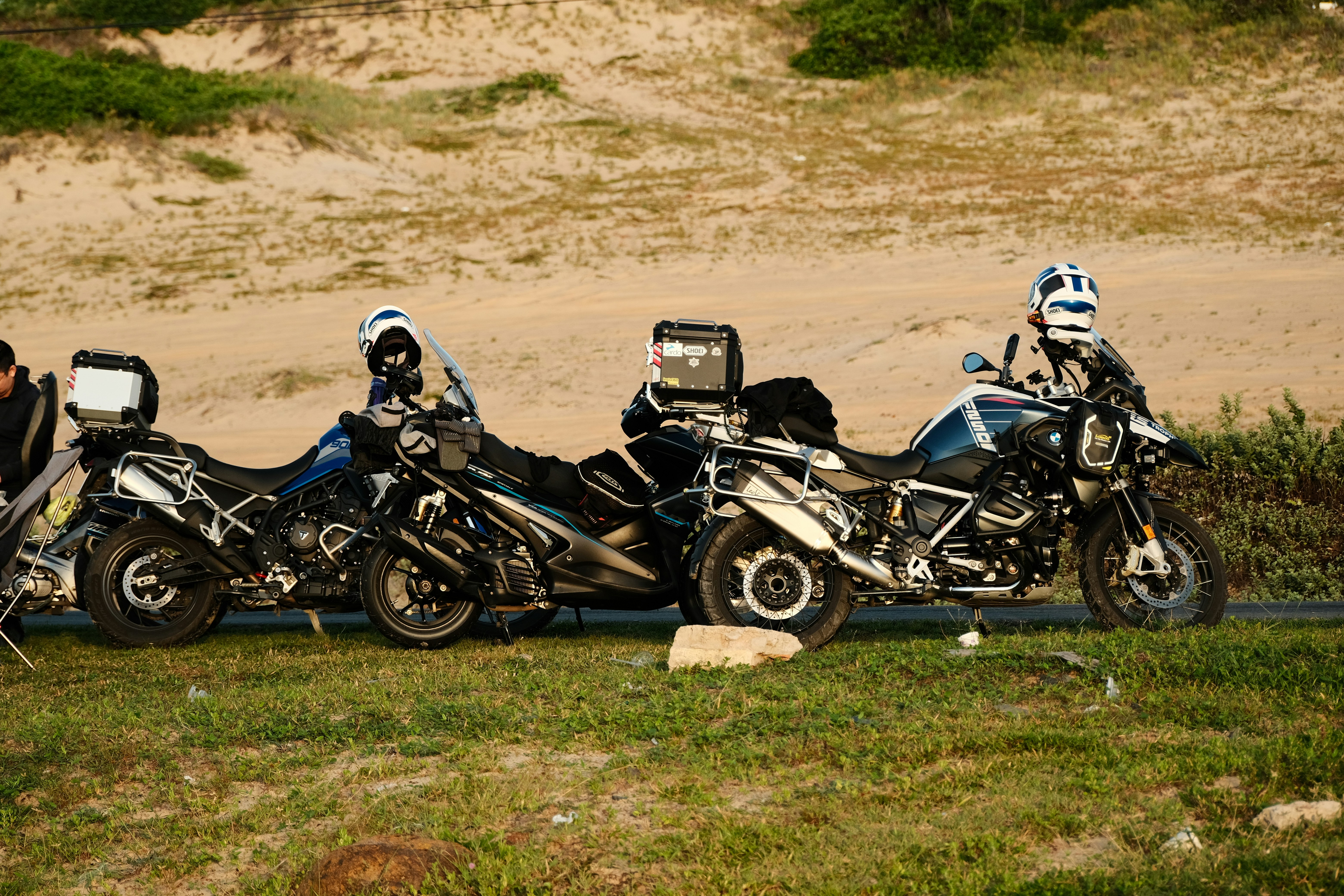 A group of motorcycles parked next to each other photo – Free Man Image ...