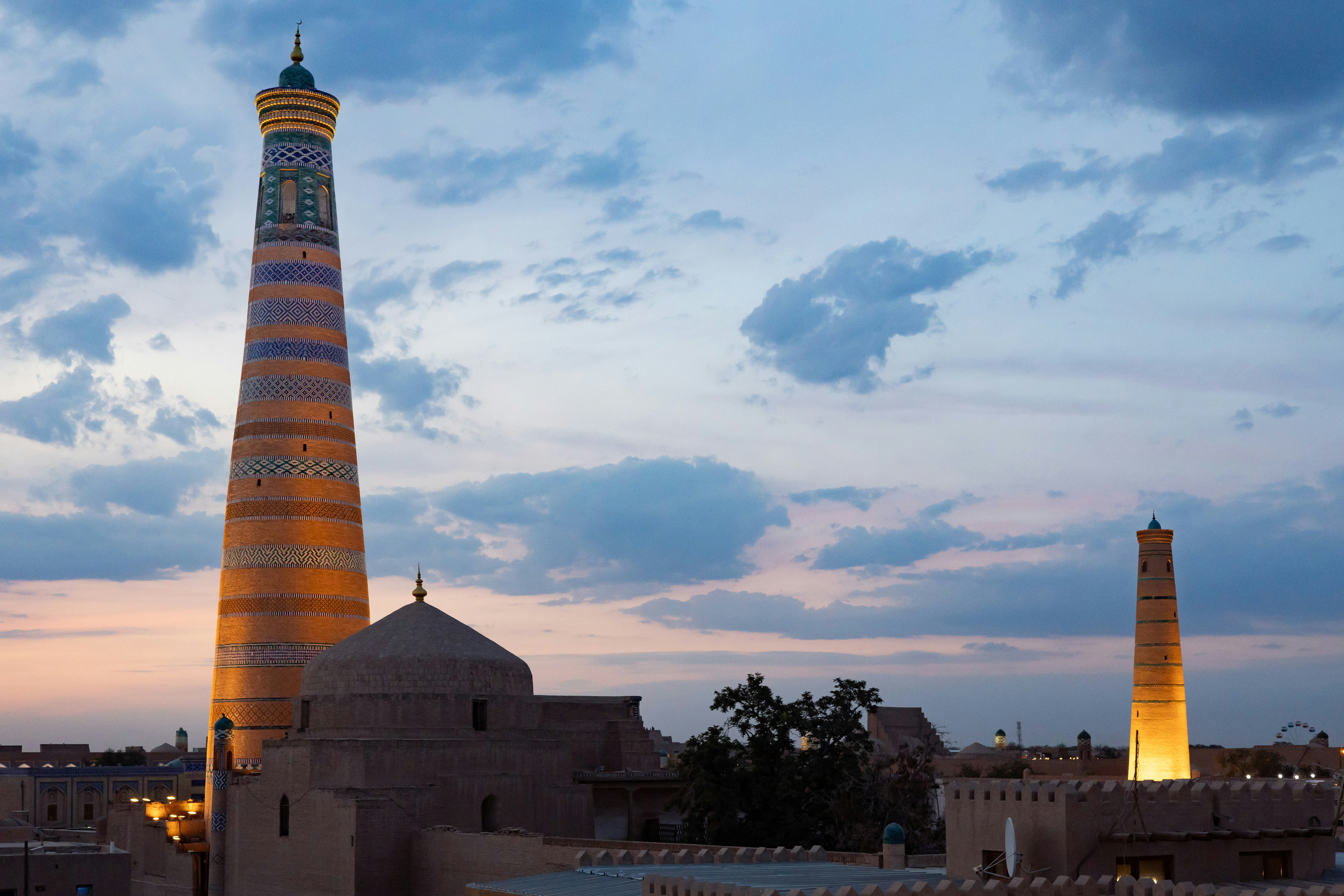 Khiva Uzbekistan Itchan Kala Sunset Ramparts Turquoise Tiled Minarets Madrasas Artisan Workshops Wood Carvings Textiles