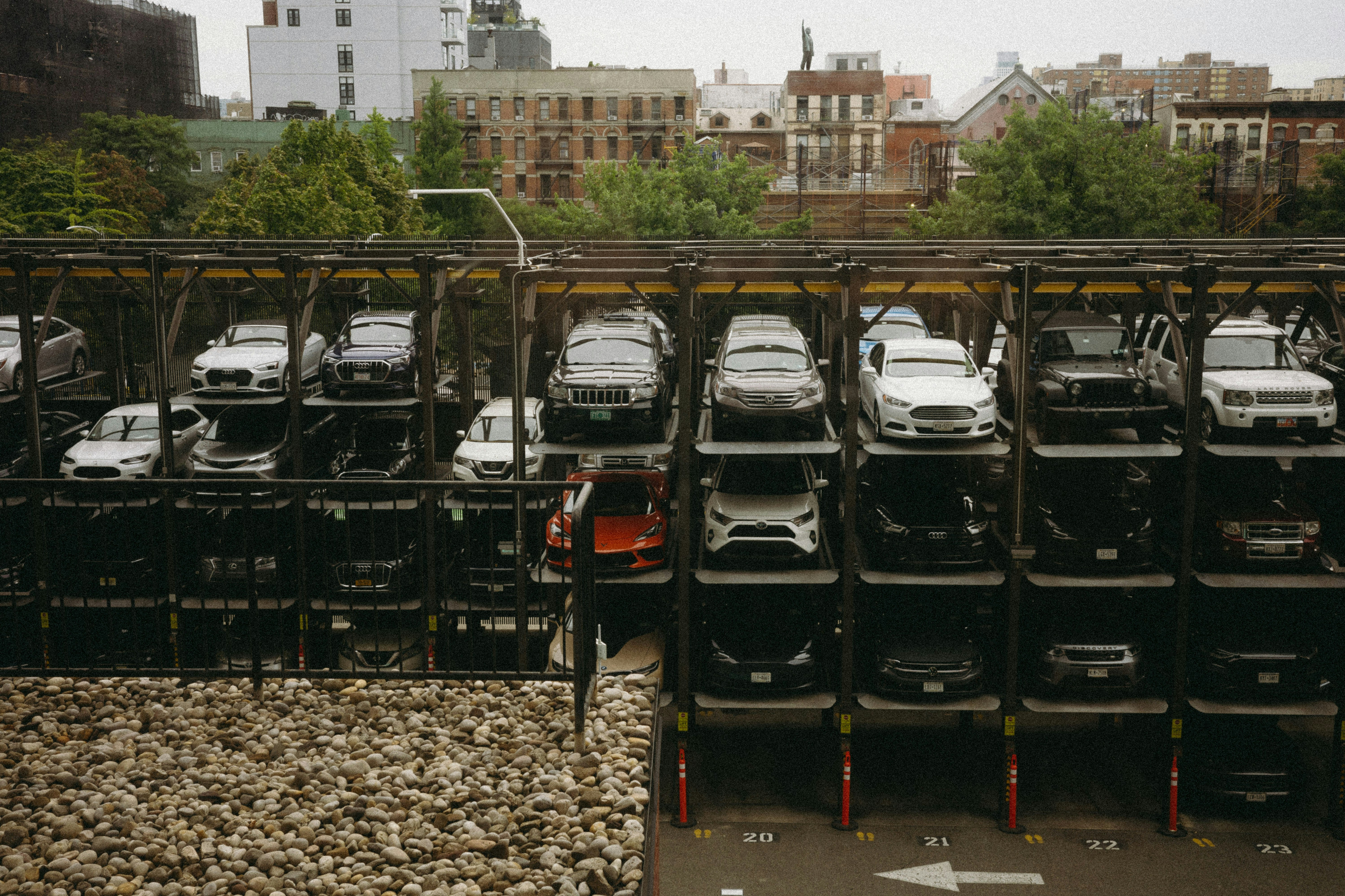 A parking lot filled with lots of parked cars