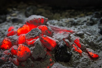 A pile of lava rocks lit up with red lights