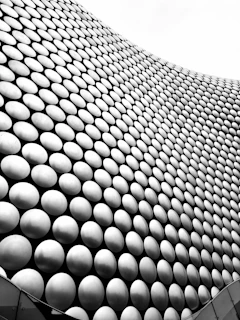 A black and white photo of a building