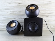 A pair of speakers sitting on top of each other