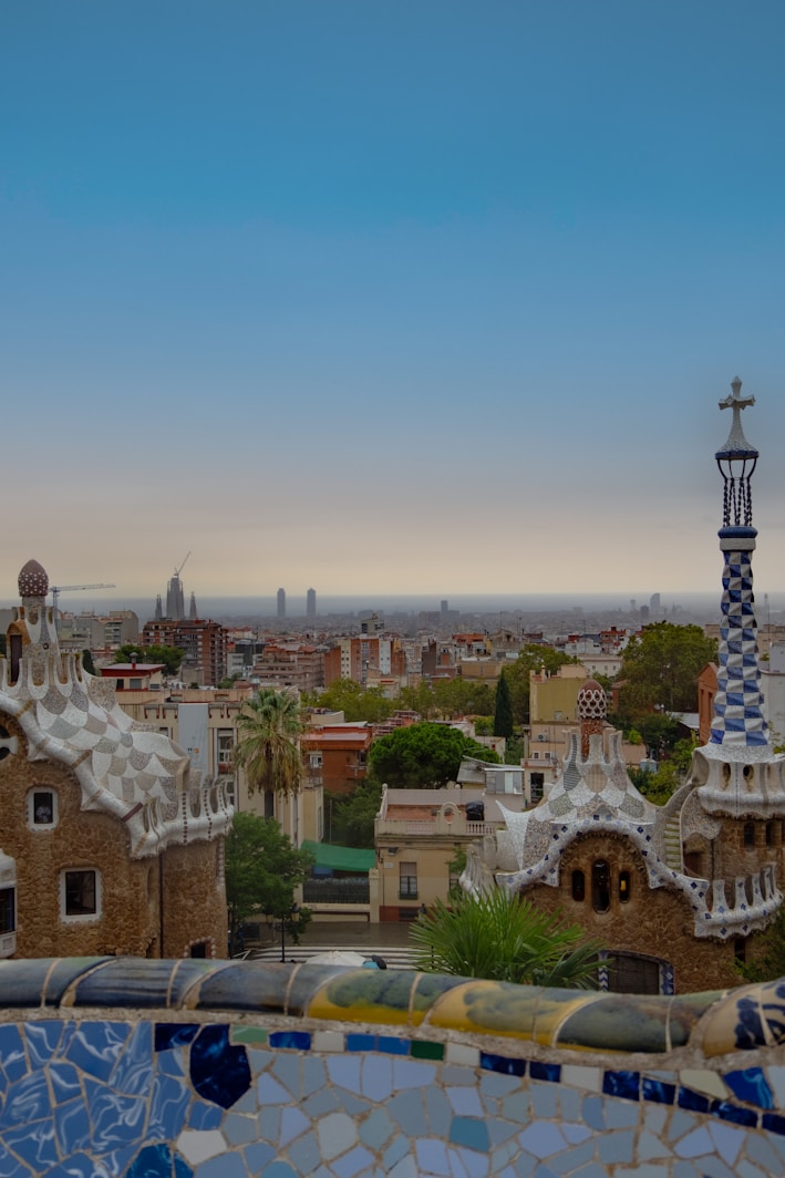 A view of a city from a rooftop of a building