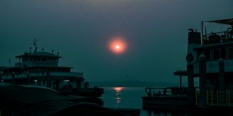 The sun is setting over a body of water