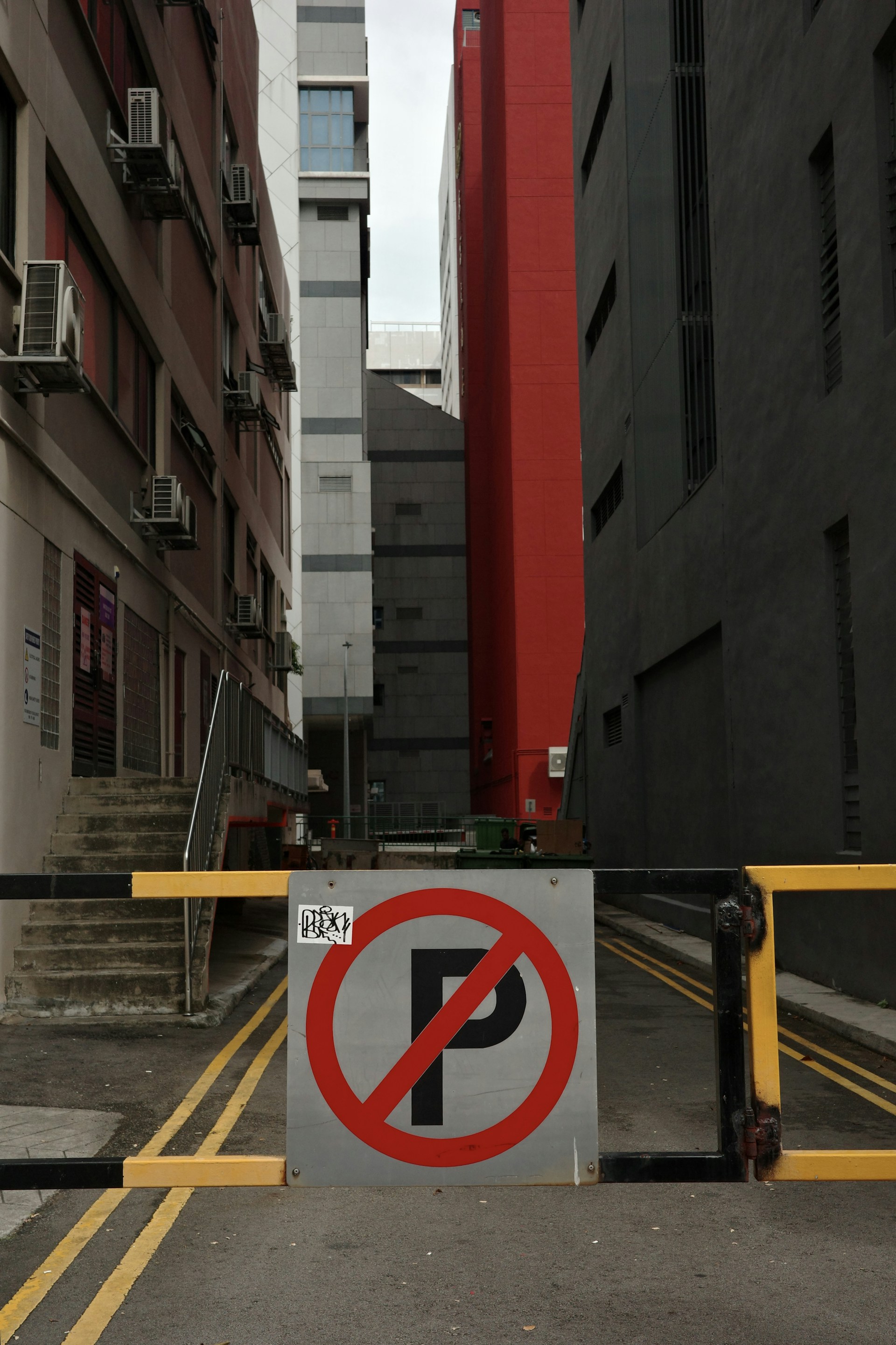 A no parking sign on a city street