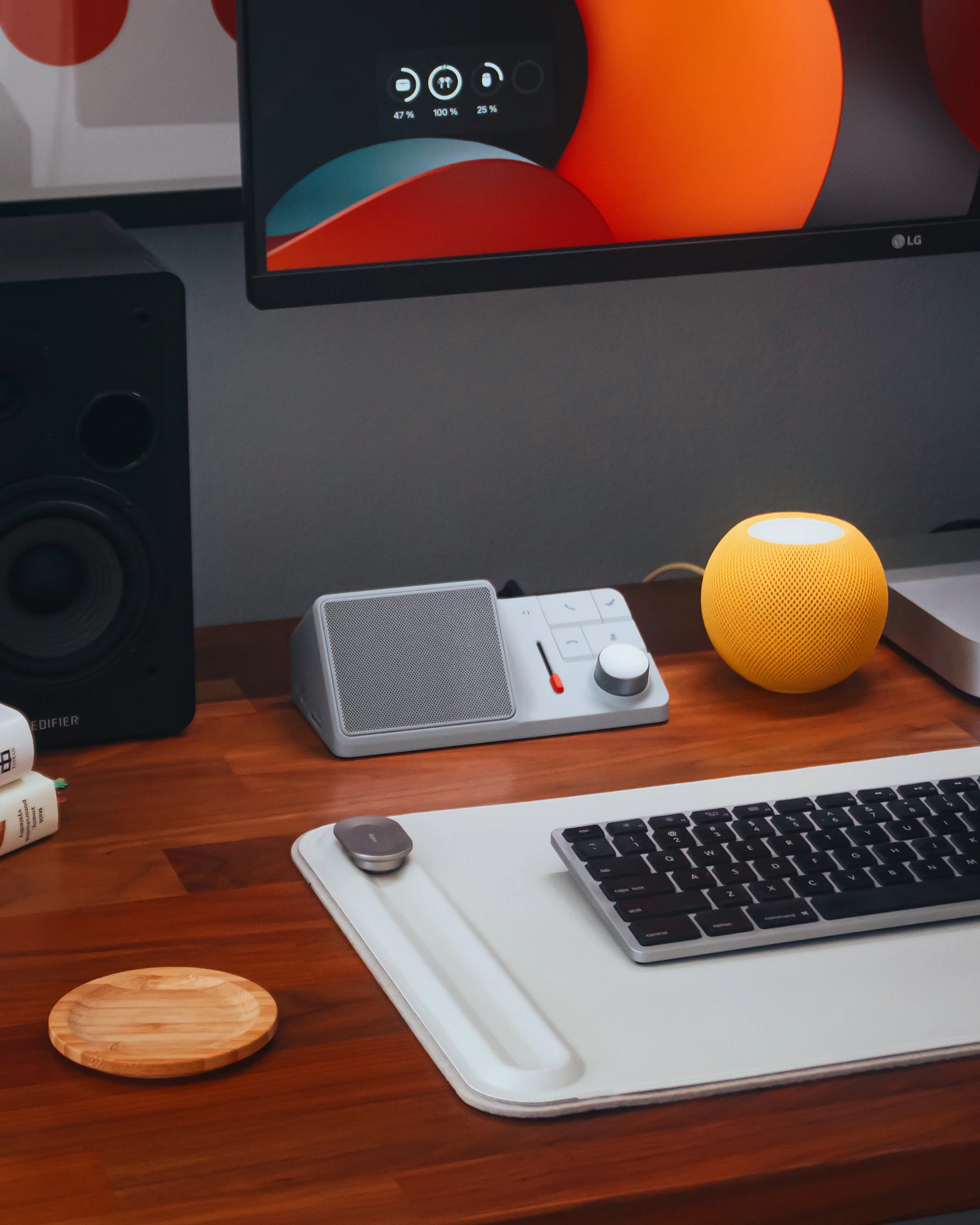 Modern technology desk with keyboard, speakers and monitor