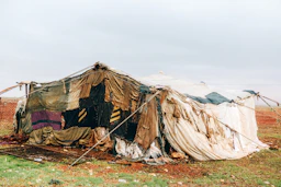 A group of tents sitting in a field