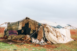 A group of tents sitting in a field