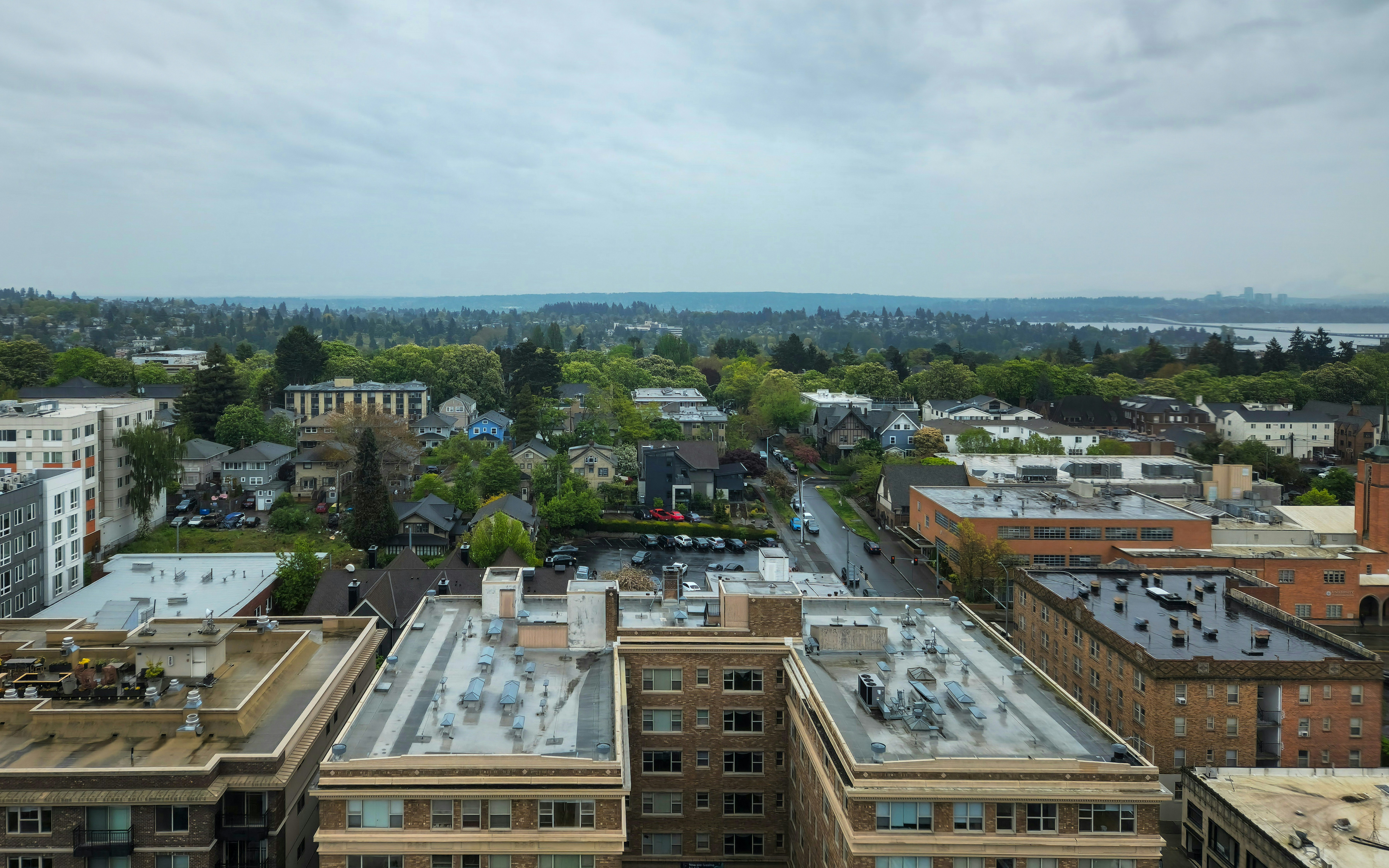 A view of a city from the top of a building