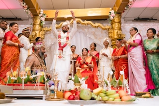 A group of people standing in front of a stage