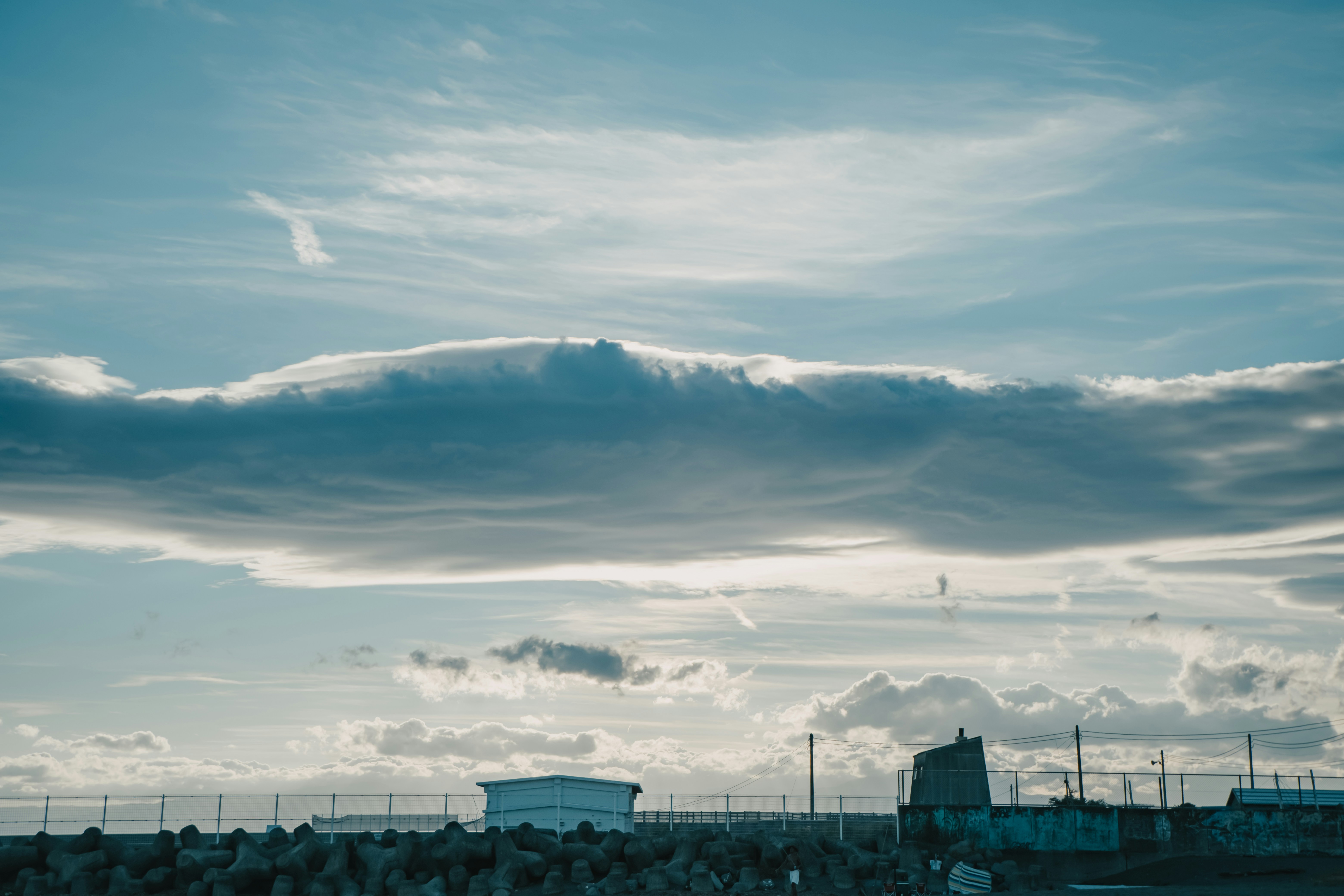 A group of people standing on top of a field