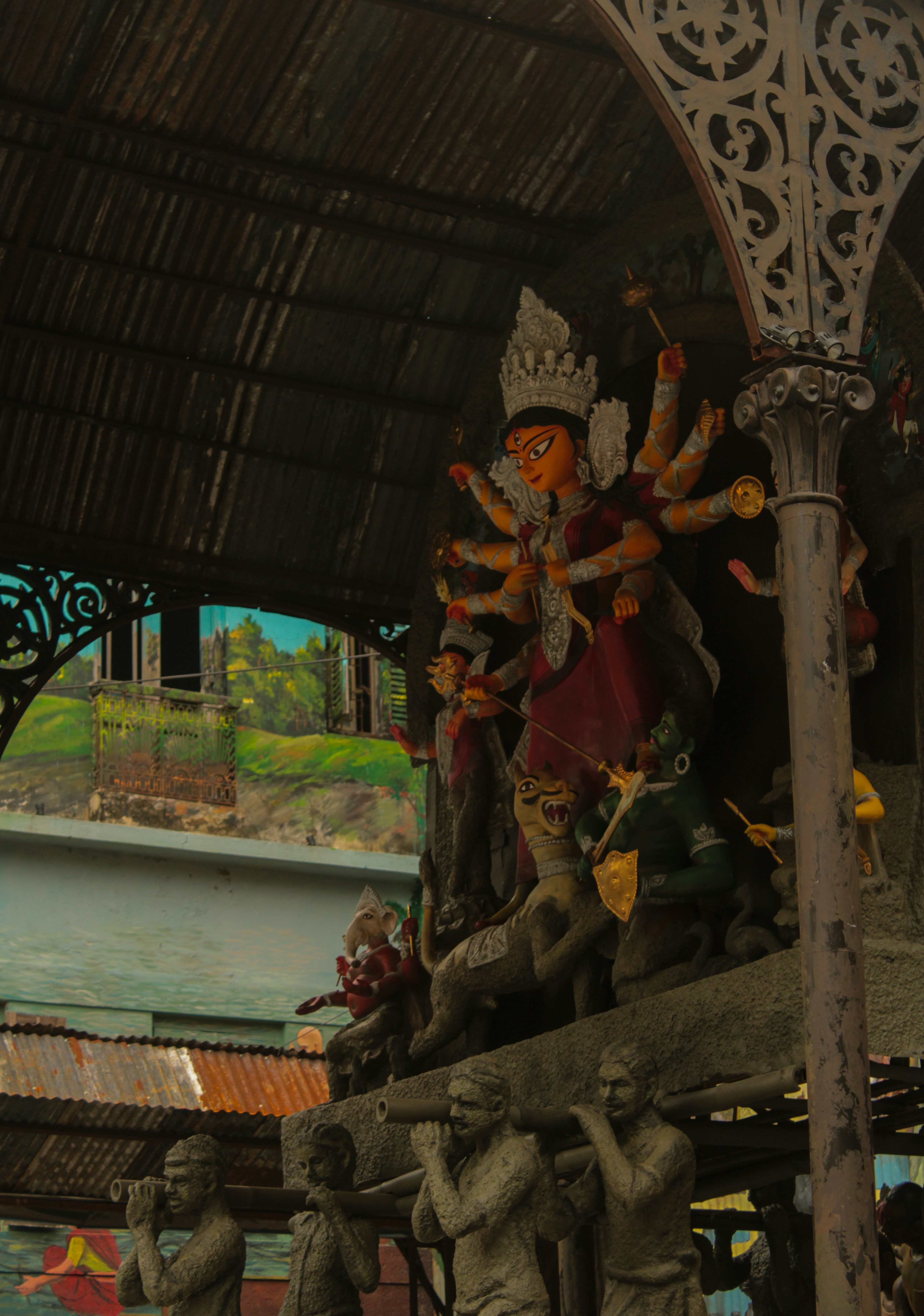 A statue of a man with a crown on his head