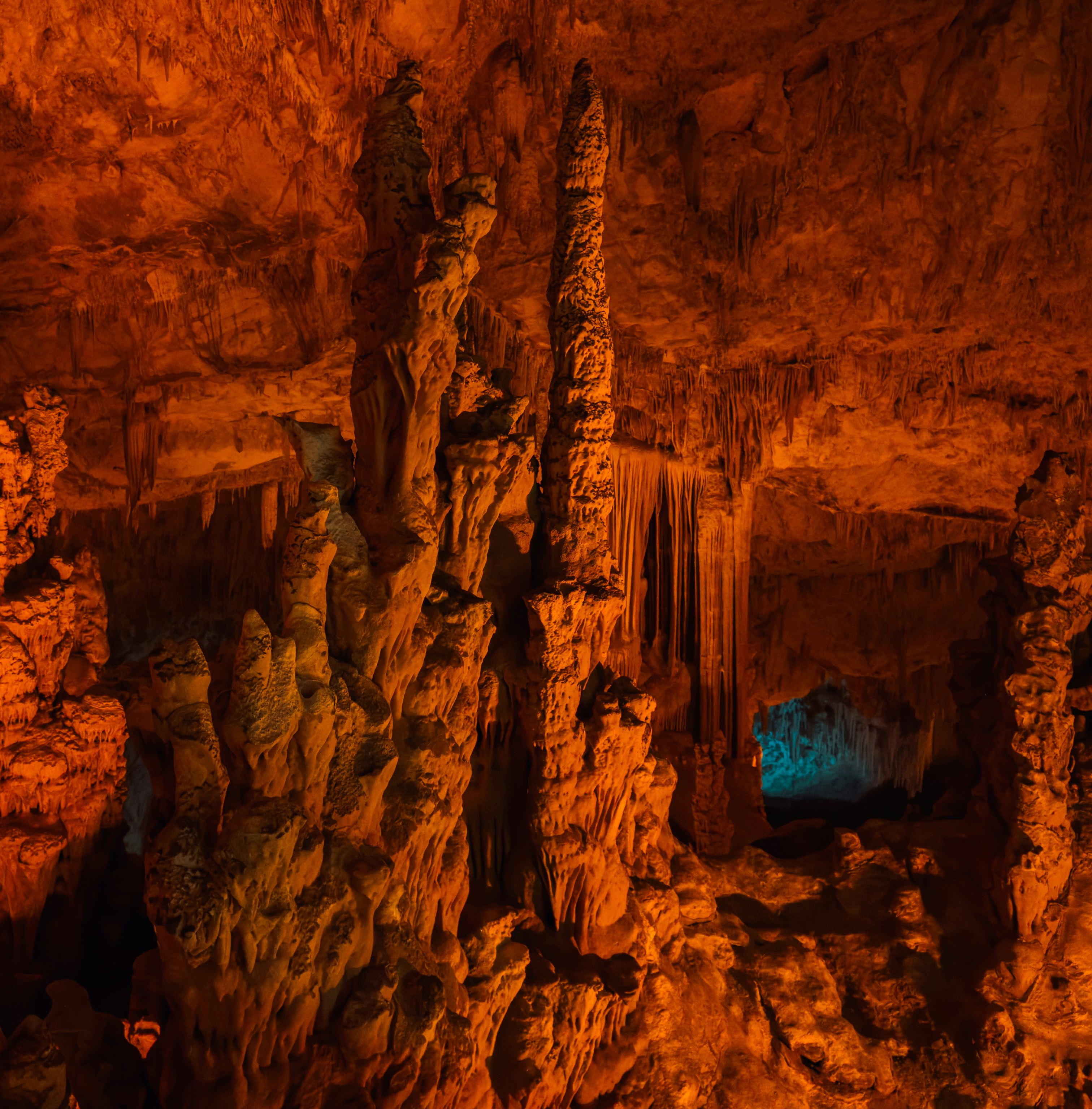 A cave filled with lots of rock formations