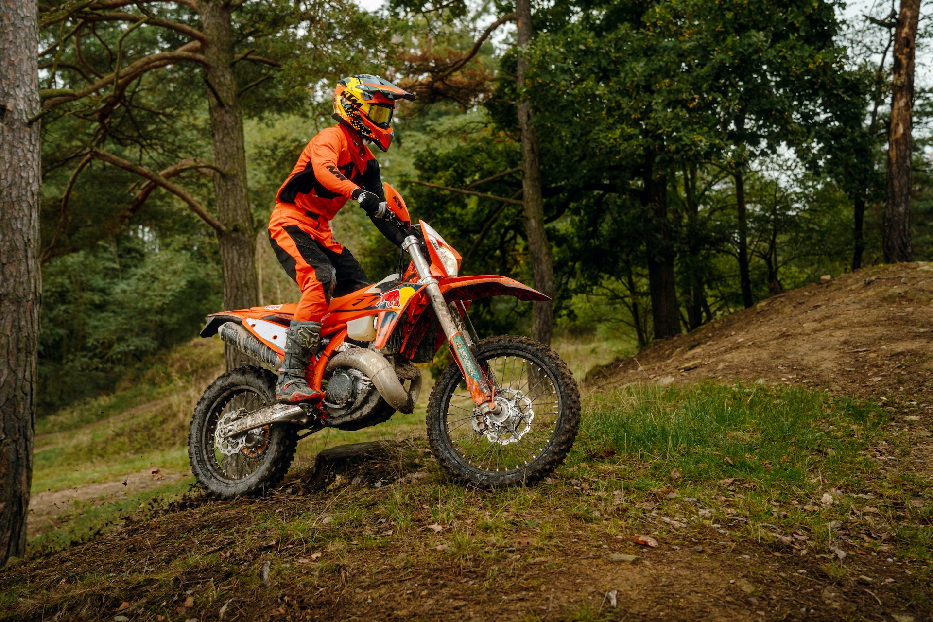 A person riding a dirt bike on a trail