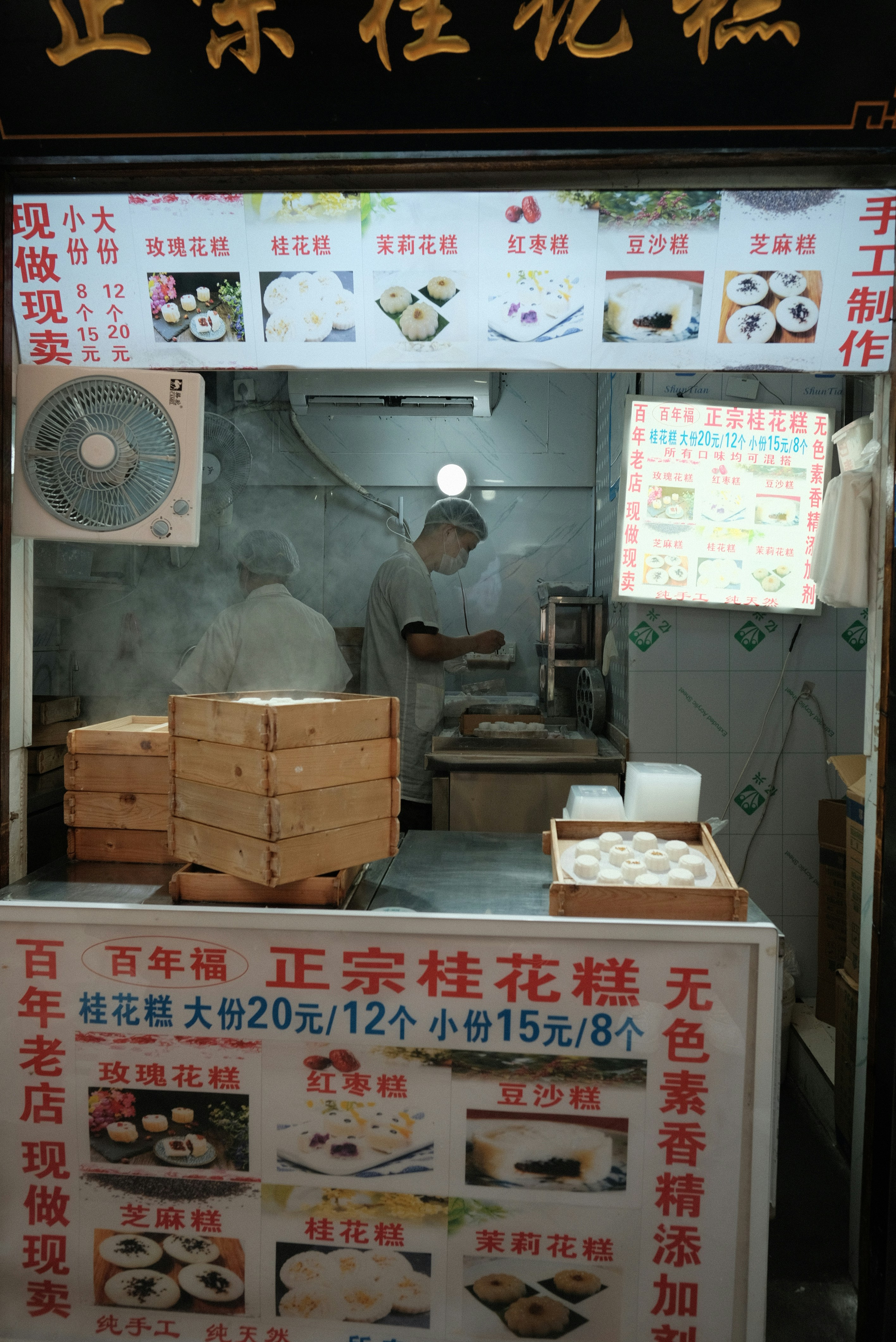 A man cooking food inside of a restaurant
