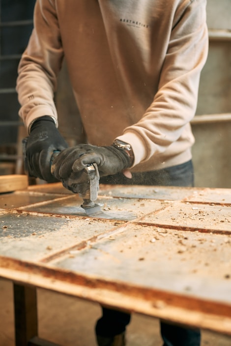 A man working on a piece of metal