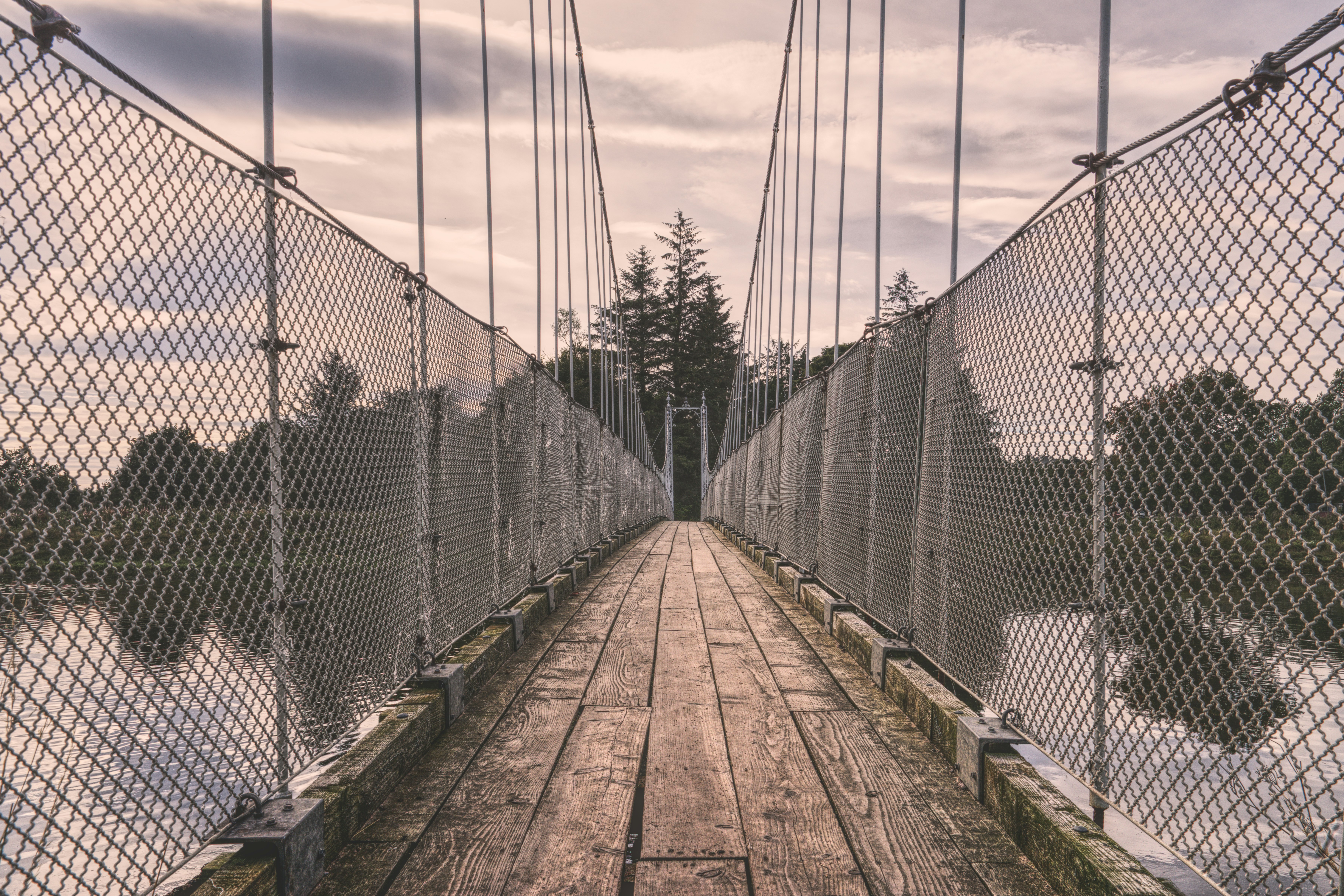 A bridge that has a bunch of wires on it