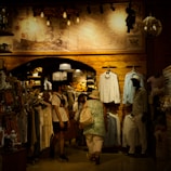 A group of people that are standing in a room