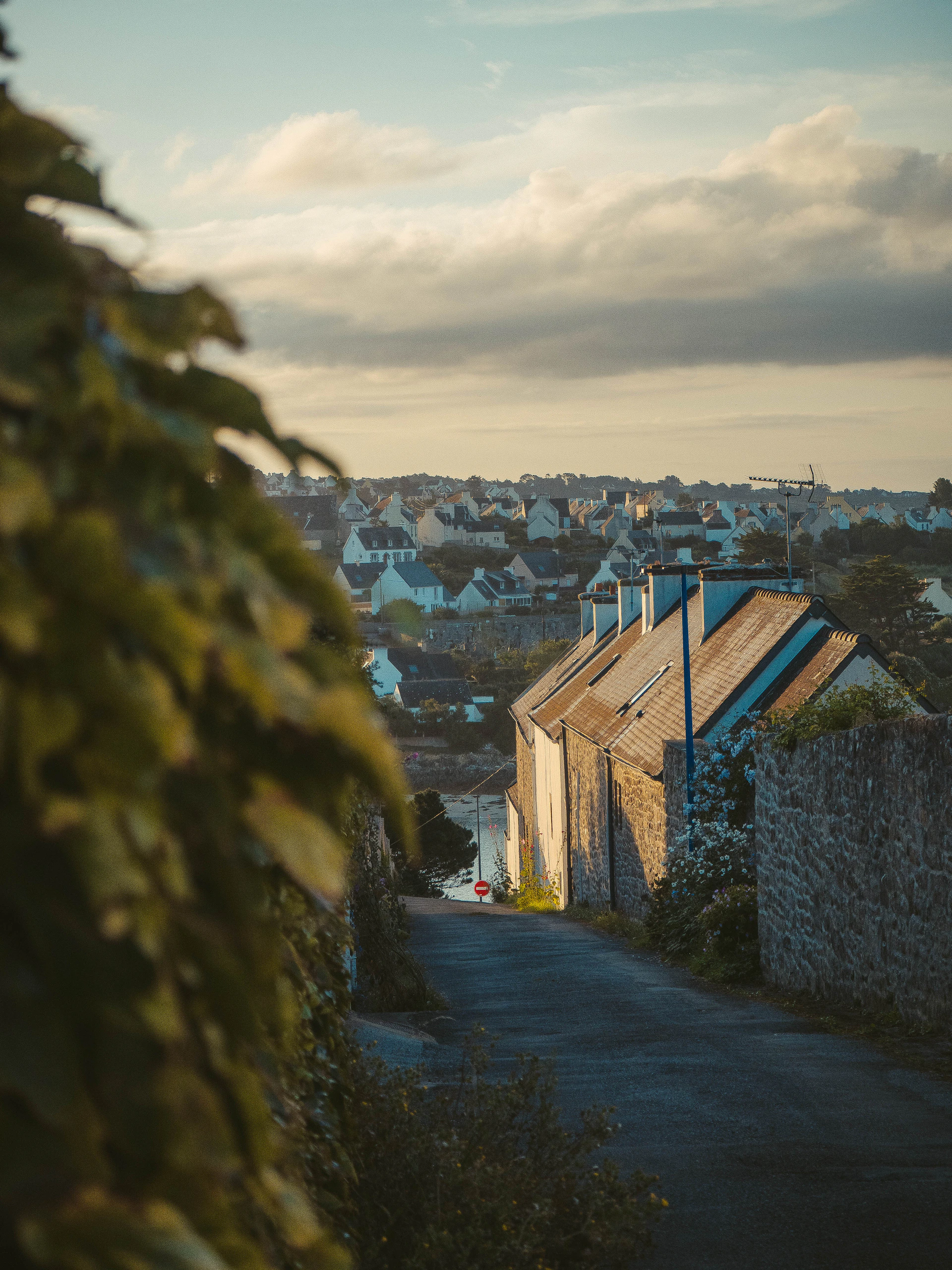 A narrow road with a building in the background