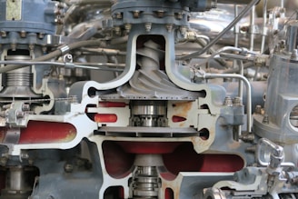 A close up of a machine with many pipes