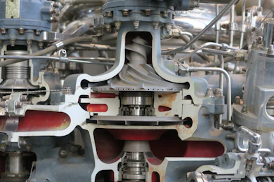 A close up of a machine with many pipes