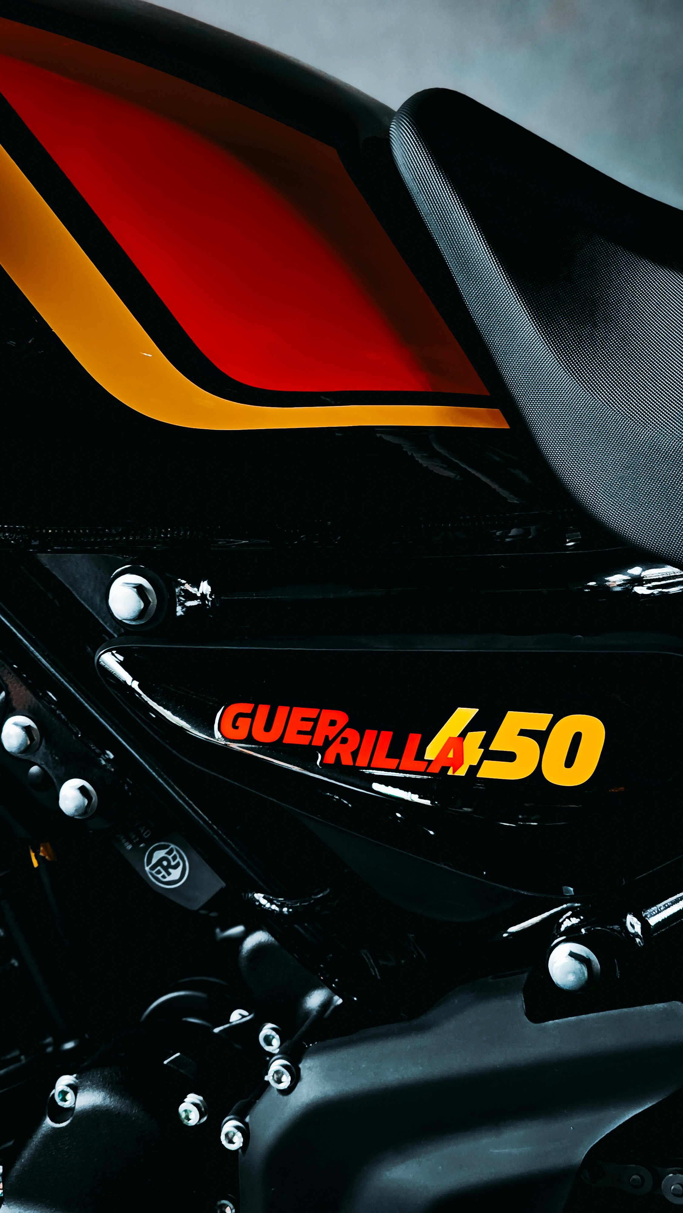 A close up of a motorcycle parked in a garage