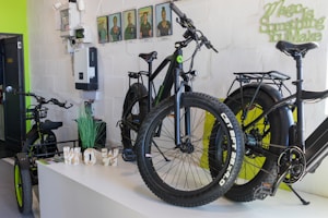 Two bikes are on display in a bike shop