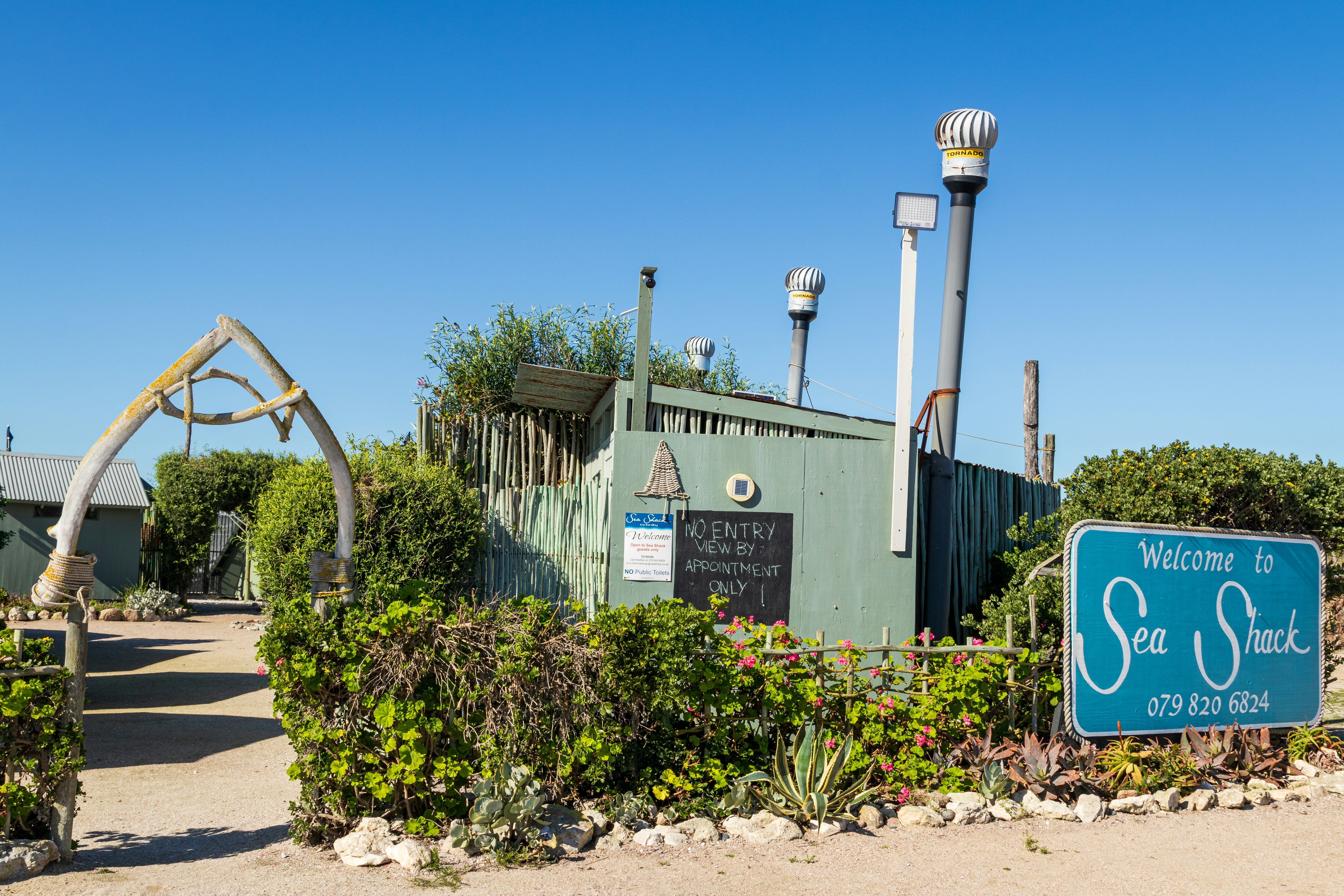 A sign that is in front of a building