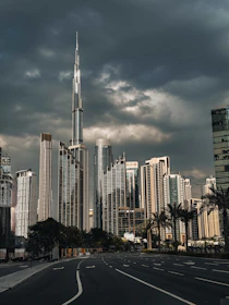 A city street with a lot of tall buildings