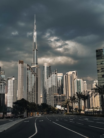 A city street with a lot of tall buildings