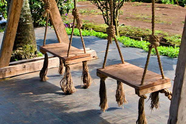 A couple of wooden benches sitting next to each other