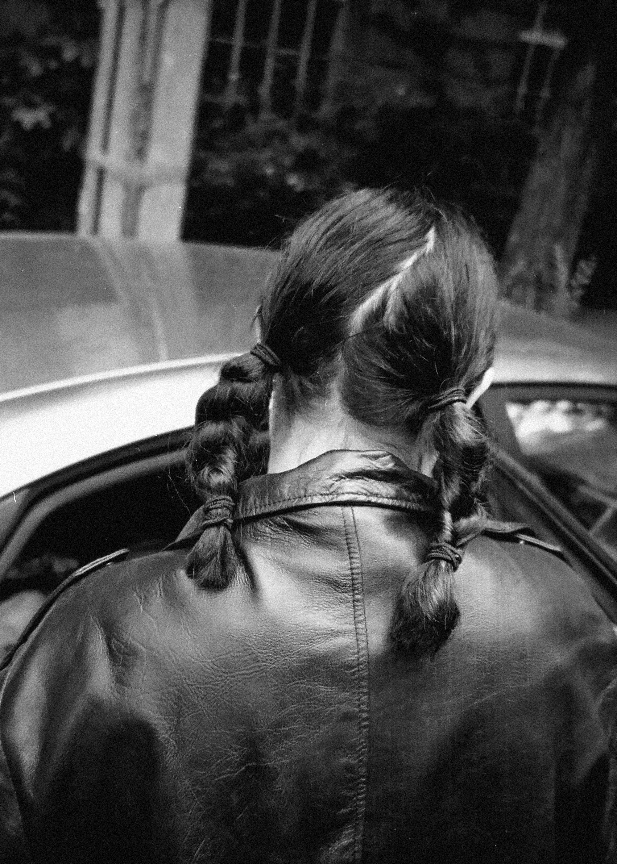 A black and white photo of a woman in a leather jacket photo – Free ...