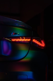 A close up of the tail lights of a car