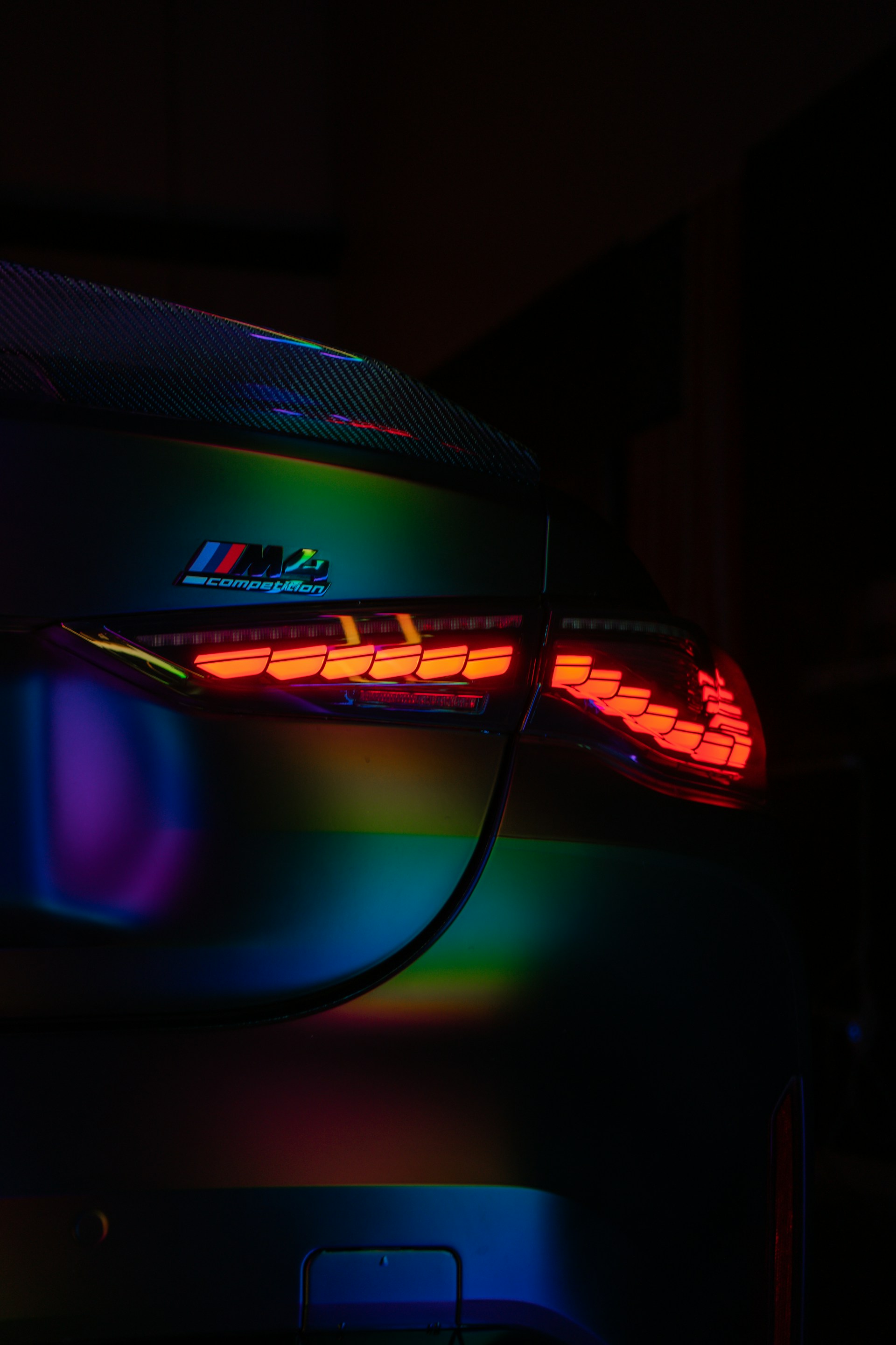 A close up of the tail lights of a car