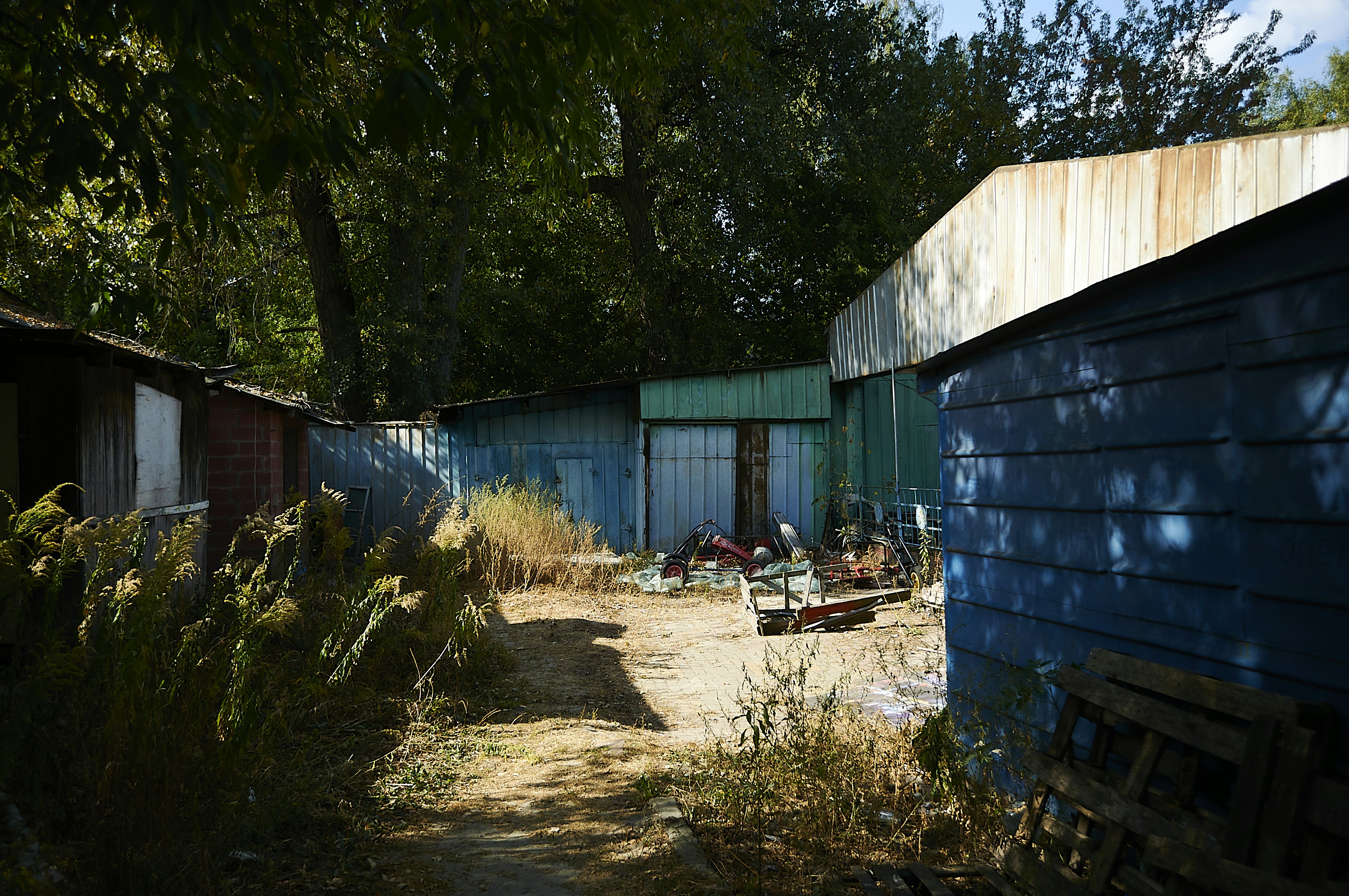 A group of blue buildings sitting next to each other