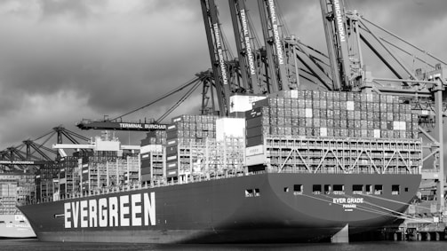 A large cargo ship docked in a harbor