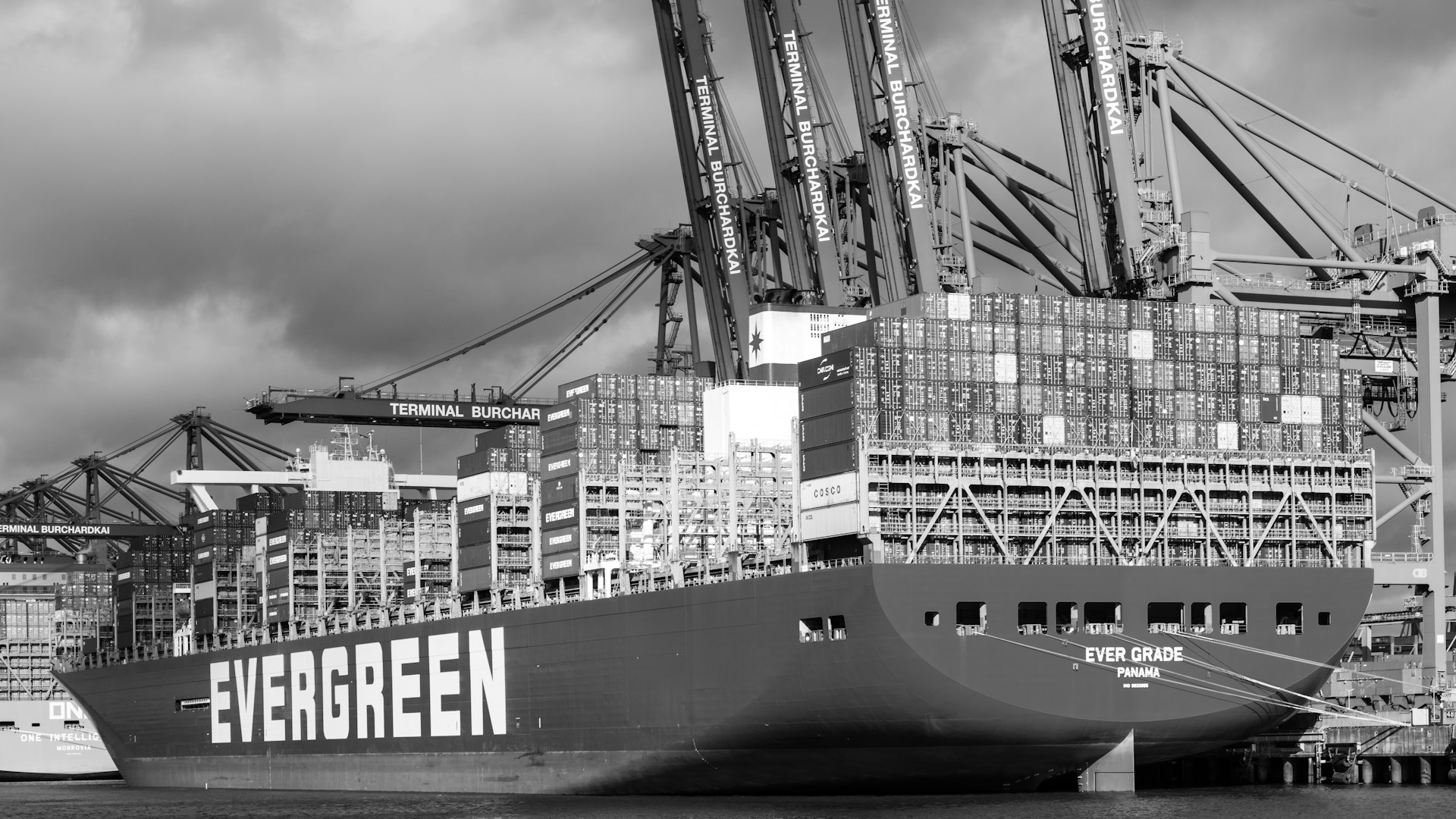 A large cargo ship docked in a harbor