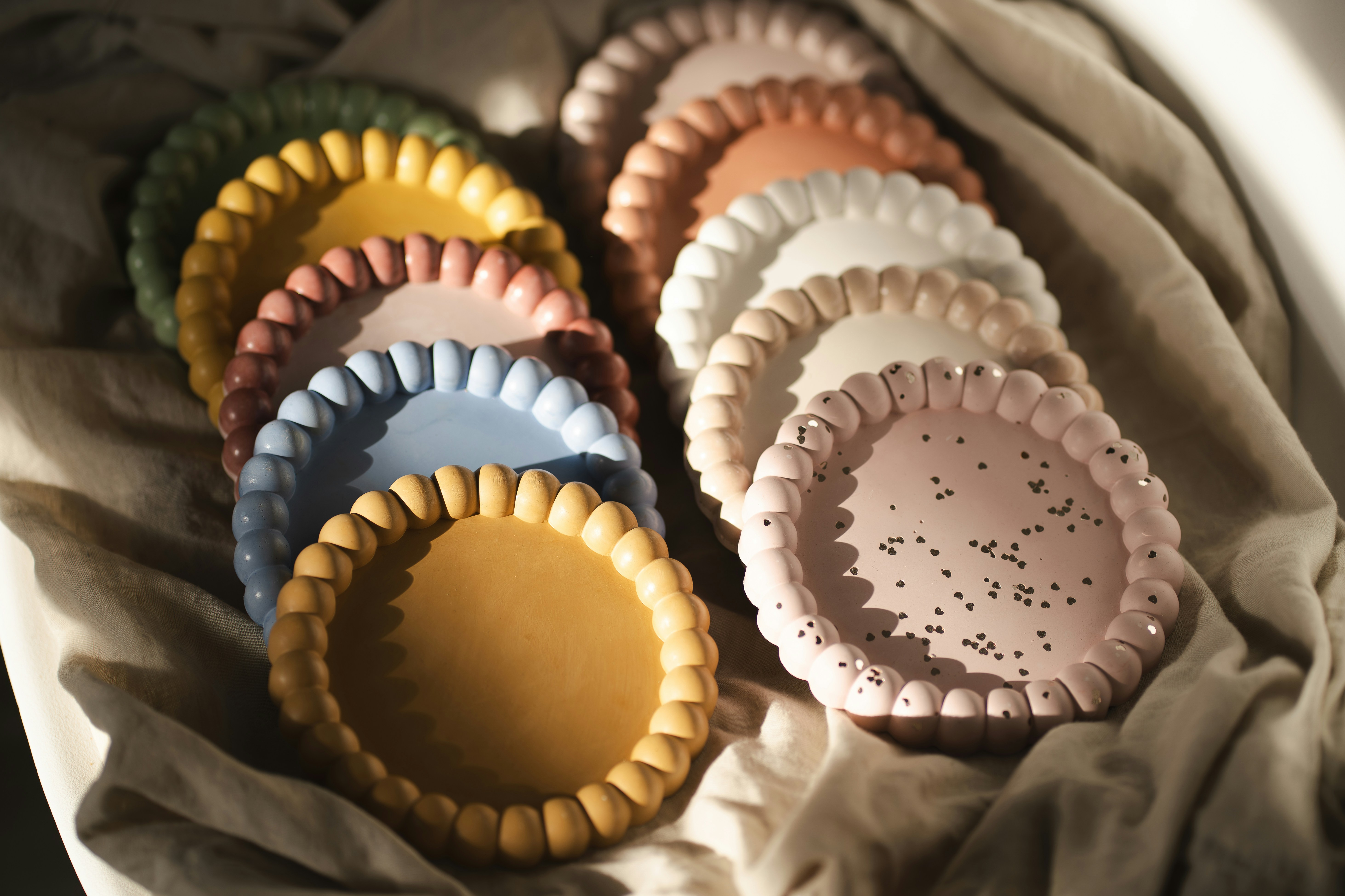 A bunch of pie plates sitting on top of a table