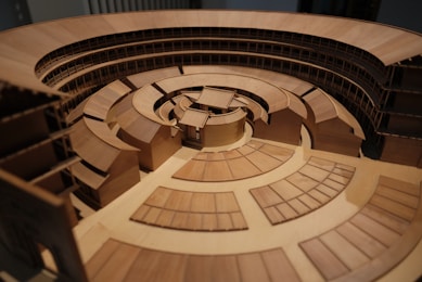 A model of a circular building with windows