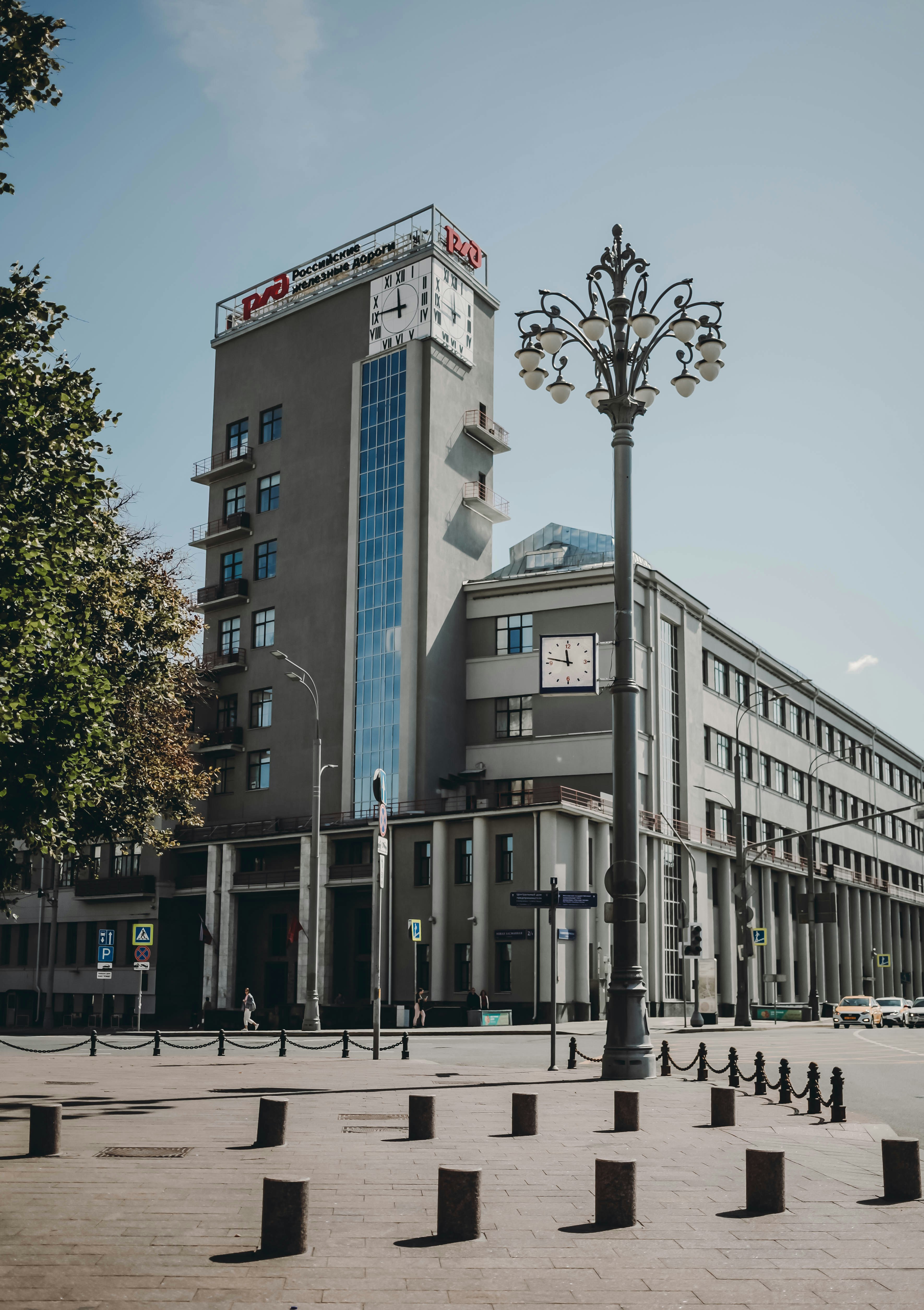 A tall building sitting next to a street light