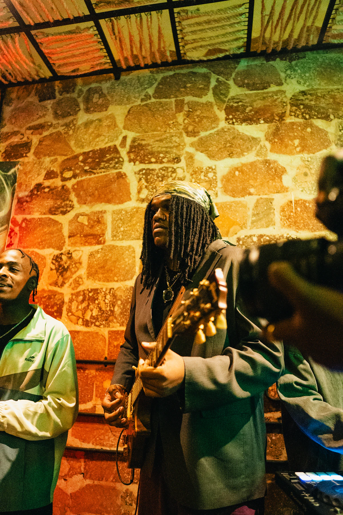 Musicians and creators gathered together outdoors.