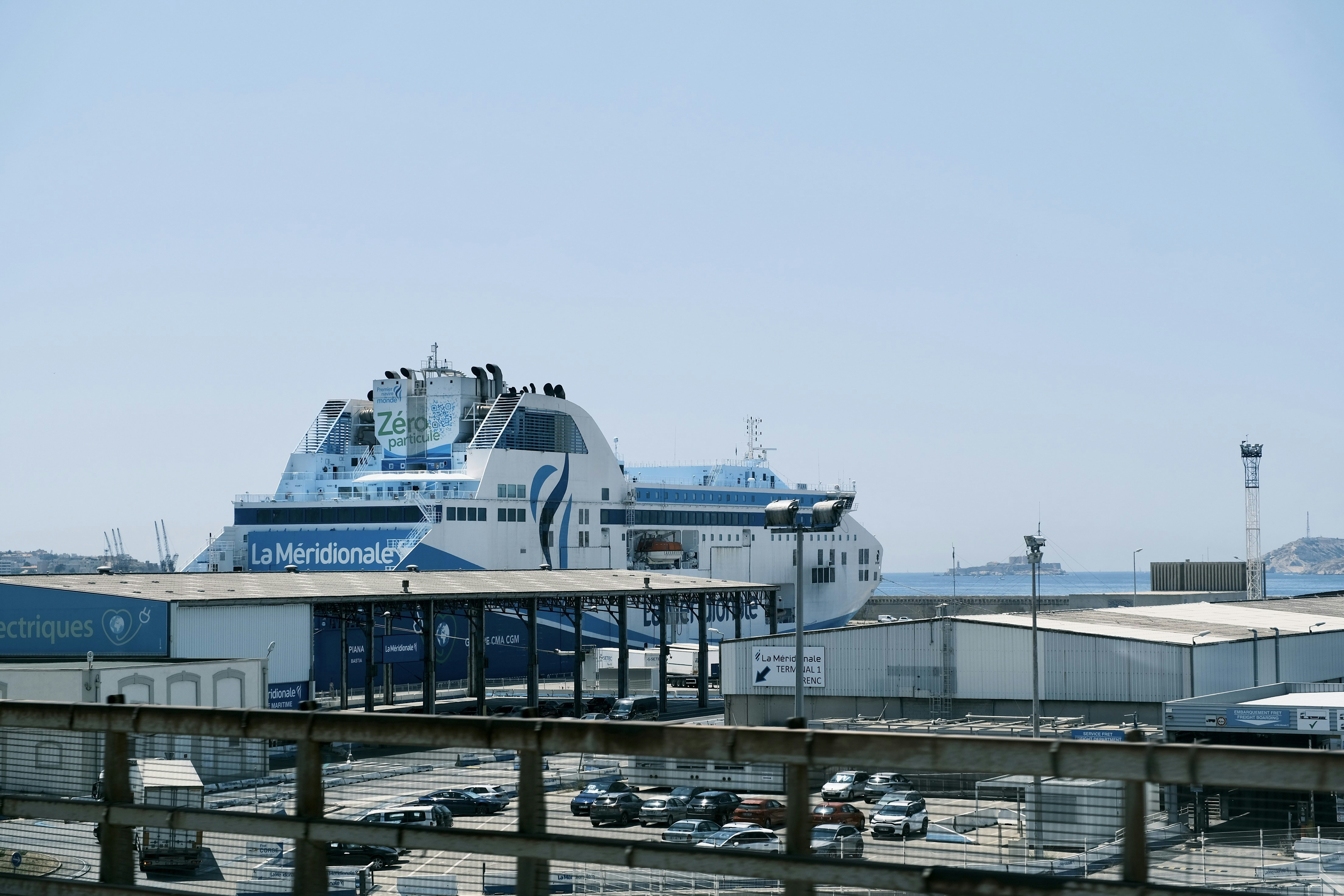 A large cruise ship docked at a dock