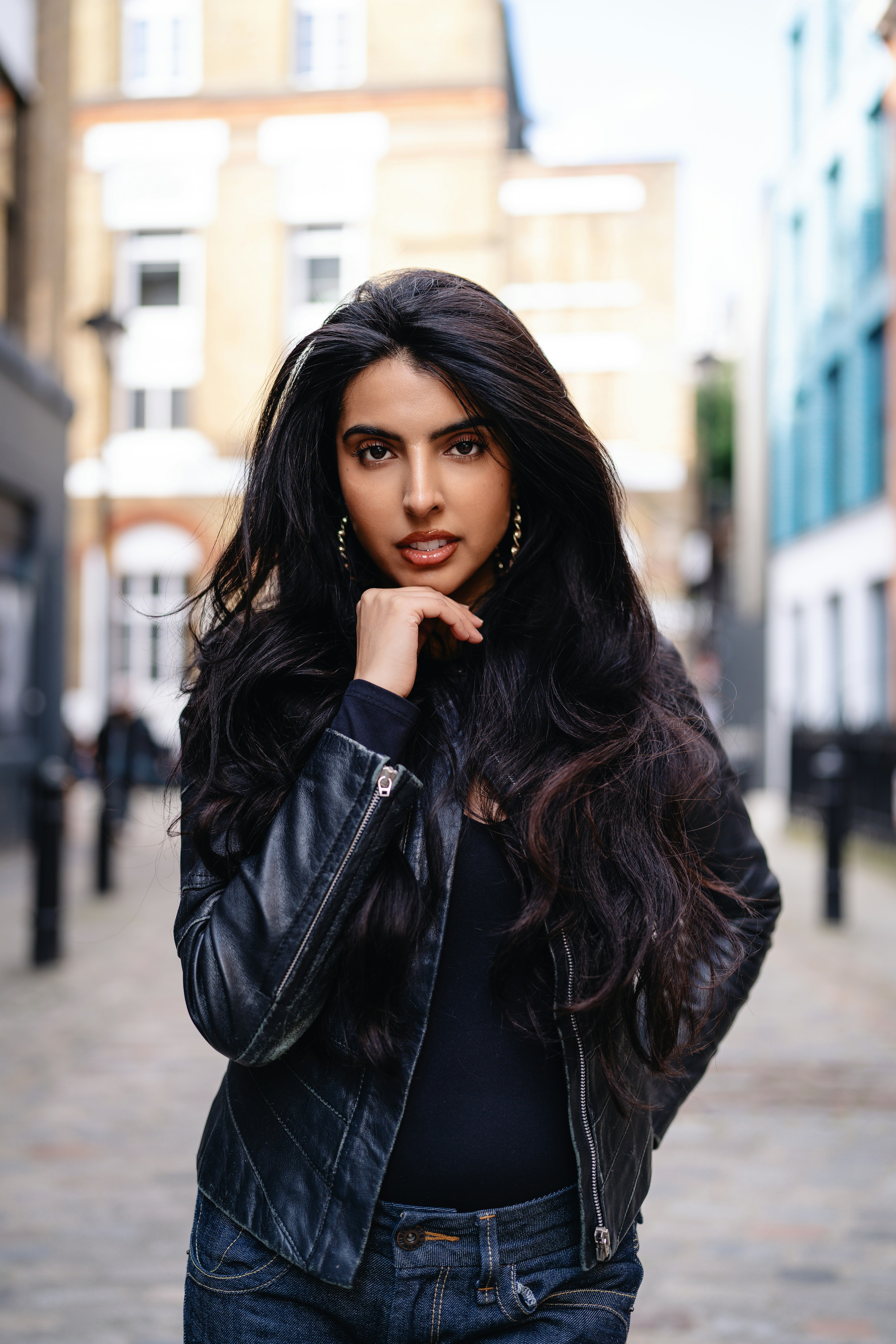 A woman in a leather jacket is posing for a picture photo – Free London ...