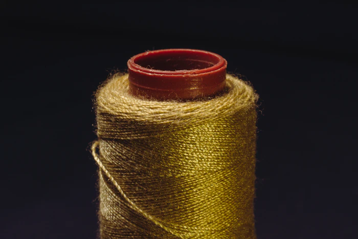 Spool of gold embroidery thread
