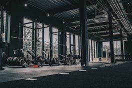 A large gym with a lot of machines