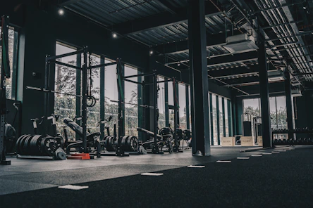 A large gym with a lot of machines