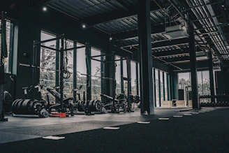 A large gym with a lot of machines