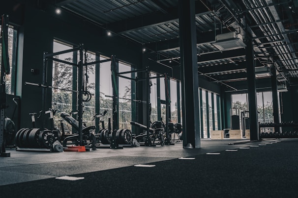 A large gym with a lot of machines