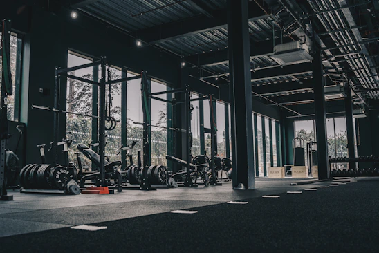 A large gym with a lot of machines