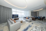 A living room filled with furniture and a flat screen TV
